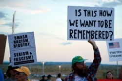 FILE - Protesters demonstrate outside the Santa Ana Star Center during President Donald Trump's rally in Rio Rancho, New Mexico, Sept. 16, 2019.