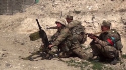An image from a video made available on the official website of the Azerbaijani Defence Ministry on Sept. 28, 2020, allegedly shows Azeri troops conducting a combat operation during clashes between Armenian separatists and Azerbaijan.