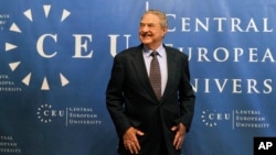 FILE - Hungarian-born U.S. billionaire and investor George Soros is seen ahead of a lecture at the Central European University (CEU), founded by him, in Budapest, Hungary.