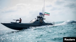 FILE - A boat of Iran's Revolutionary Guard is seen at undisclosed coordinates in the Persian Gulf, Aug 22, 2019. (West Asia News Agency via Reuters)