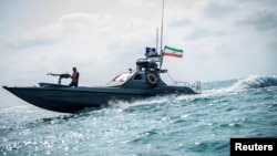 FILE - A boat of Iran's Revolutionary Guard is seen at undisclosed coordinates in the Persian Gulf, Aug 22, 2019. (West Asia News Agency via Reuters)