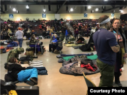 Veterans and "water protectors" from the Oceti Sakowin camp have been taking shelter in the nearby Prairie Knights Casino and Resort as a blizzard rages through North Dakota, Dec. 6, 2016. (Credit: D. Beckmann)
