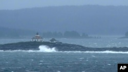 Waves crash on Egg Rock off the coast of Acadia National Park during severe weather on Sept. 16, 2023, near Bar Harbor, Maine. 