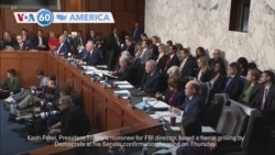 VOA60 America - Investigators recover black boxes from Washington plane crash