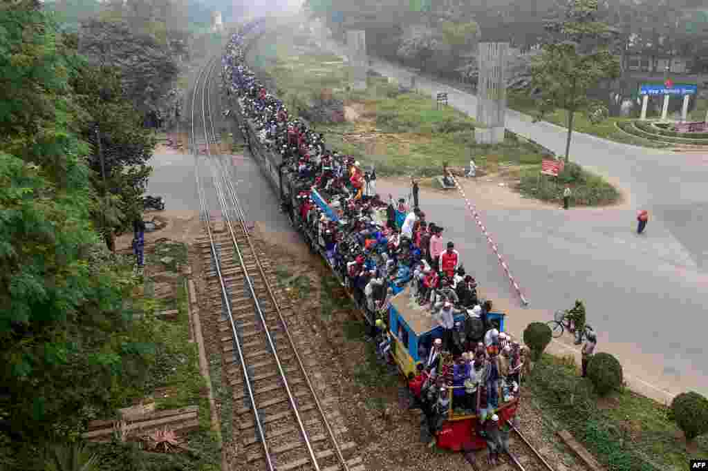 Muslim devotees leave after taking part in the Akheri Munajat, or final prayers, during the annual Muslim gathering &#39;Biswa Ijtema&#39; in Tongi, some 30 kms north of Dhaka, Bangladesh.