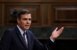 FILE - Spain’s acting Prime Minister Pedro Sanchez speaks during a plenary session at Parliament in Madrid, Spain, Sept. 11, 2019.