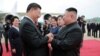 North Korean leader Kim Jong Un welcomes Chinese President Xi Jinping at the Pyongyang International Airport in Pyongyang, North Korea, in this undated photo released June 21, 2019 by North Korea's Korean Central News Agency.