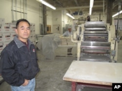 According to factory owner Tim Louie, fortune cookies make up about one-quarter of his business.