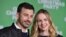FILE - Jimmy Kimmel, left, and Molly McNearney arrive at the Los Angeles premiere of "Office Christmas Party" at the Village Theatre Westwood, Dec. 7, 2016. 