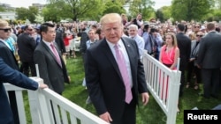 U.S. President Donald Trump attends the 2019 White House Easter Egg Roll on the South Lawn of the White House in Washington, April 22, 2019. 