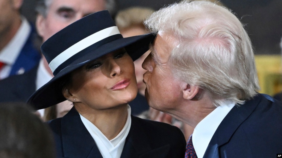 President-elect Donald Trump kisses Melania Trump before the 60th Presidential Inauguration in the Rotunda of the U.S. Capitol in Washington, Jan. 20, 2025. 