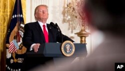 President Donald Trump takes a question during a news conference, Feb. 16, 2017, in the East Room of the White House in Washington. 