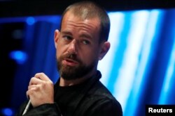 FILE - Jack Dorsey, CEO and co-founder of Twitter and founder and CEO of Square, speaks at the Consensus 2018 blockchain technology conference in New York City, New York, May 16, 2018.