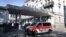 A police van drives past the Baur au Lac hotel in Zurich, Switzerland, May 27, 2015. Six soccer officials were arrested in Zurich on Wednesday and detained pending extradition to the United States over suspected corruption at soccer's governing body FIFA,