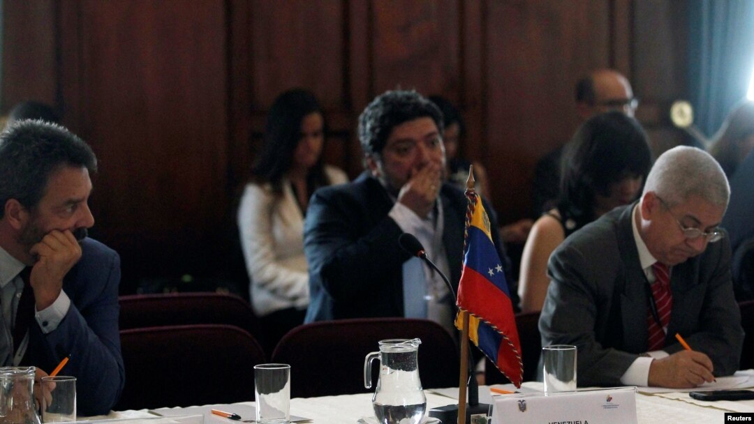 The empty place of the representative of Venezuela is seen during a regional summit to discuss a worsening exodus of migrants fleeing Venezuela and overwhelming South American countries, in Quito, Ecuador, Sept. 3, 2018.