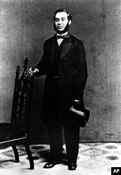 This is a 1850s photograph of Levi Strauss, who originated the denim blue jeans that bear his first name. Strauss emigrated from Bavaria with his family to New York City in 1847. In 1953 he built a clothing factory in San Francisco, supplying tough denim