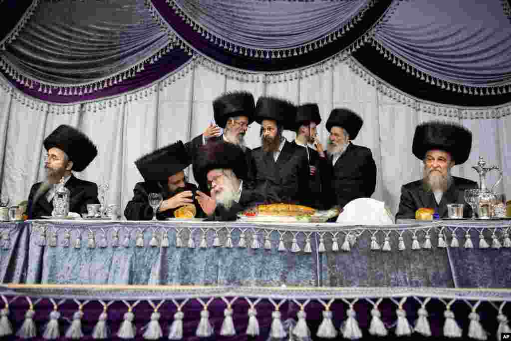 Ultra-Orthodox Jews attend the wedding ceremony of Hannah Halbershtam and Menahem Nachum, the son of the Rabbi of the Nadvorna Hasidic dynasty, in the ultra-Orthodox town of Bnei Brak near Tel Aviv, Israel, Aug. 20, 2019.