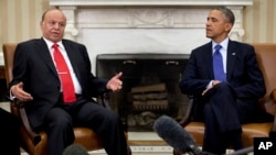 President Barack Obama and Yemen's President, Abdo Rabby Mansour Hadi talk to the media as they meet at the White House, August 1, 2013, in Washington.