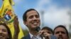 Juan Guaido, président auto-proclamé intérim du Venezuela, devant ses partisans sur une place publique du quartier de Las Mercedes à Caracas, au Venezuela, le samedi 26 janvier 2019. (AP Photo / Rodrigo Abd)