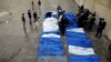 Syria gom nhặt xác người thối rữa trên đường phố Aleppo