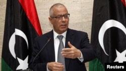 Libya's Prime Minister Ali Zeidan speaks during a news conference in Tripoli, Mar. 8, 2014. 