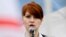 FILE - Maria Butina, leader of a pro-gun organization in Russia, speaks to a crowd during a rally in support of legalizing the possession of handguns in Moscow, Russia, April 21, 2013.