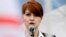 FILE - Maria Butina speaks at a rally in support of legalizing the possession of handguns, in Moscow, Russia, April 21, 2013. 