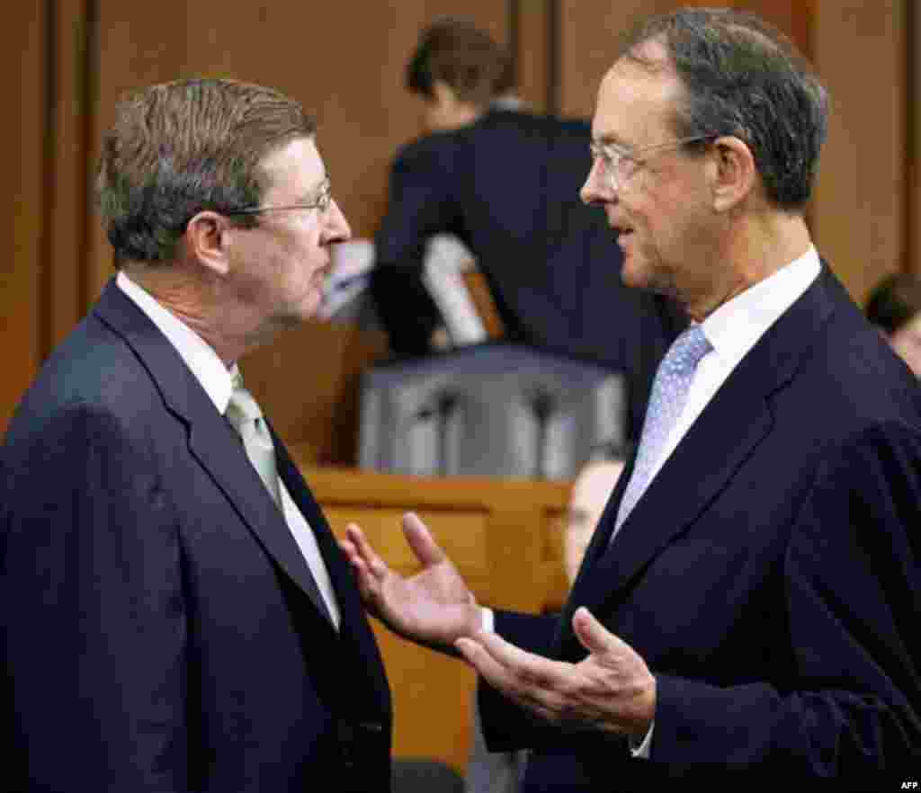 Debt Commission member, Senate Budget Committee Chairman Sen. Kent Conrad, D-N.D., left , talks with co-chairmen Erskine Bowles, before a meeting of the commission on Capitol Hill in Washington, Wednesday, Dec. 1, 2010. (AP Photo/Alex Brandon)