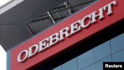 FILE - A sign of the Odebrecht SA construction conglomerate is pictured in Lima, Peru, June 28, 2016.