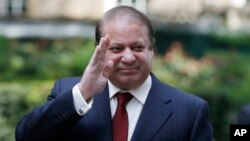 FILE - Pakistani Prime Minister Nawaz Sharif on Thursday warned India against making any incursion into Pakistan, saying, “We will protect our vital interest, God willing, at all cost."