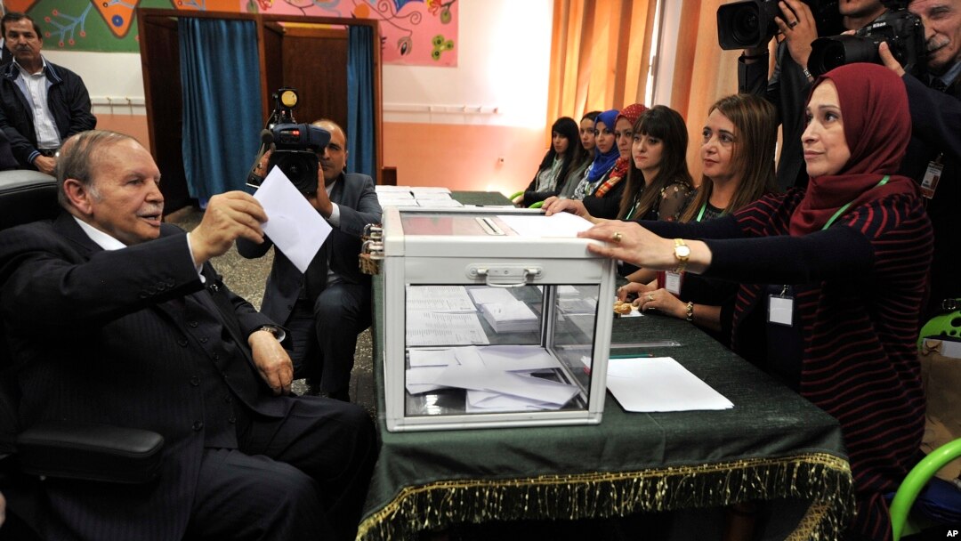FILE - Algerian President Abdelaziz Bouteflika casts his election ballot in Algiers, May 4, 2017.