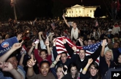 Crowds celebrate outside the White House in Washington early Monday following President Obama's televised announcement.