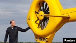 Britain's Prince William starts his final shift with the East Anglian Air Ambulance at Cambridge Airport, England, July 27, 2017. 