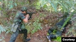 စစ်ကောင်စီတပ်နဲ့ ရင်ဆိုင်တိုက်ခိုက်နေတဲ့ KNU တပ်ဖွဲ့ဝင်အချို့။ (ယခင်မှတ်တမ်းရုပ်ပုံ)