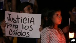 Demonstrators hold a candlelight vigil in honor of those who have died during anti-government protests in Managua, Nicaragua, April 24, 2018.