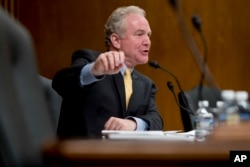 Sen. Chris Van Hollen, D-Maryland, questions EPA Administrator Scott Pruitt as he testifies before a Senate Appropriations subcommittee on Capitol Hill, May 16, 2018.