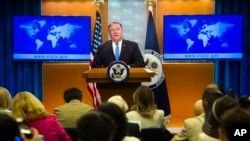 Secretary of State Mike Pompeo announces the creation of the Iran Action Group at the State Department, in Washington, Aug. 16, 2018.