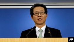 FILE - South Korean Unification Minister Ryoo Kihl-jae speaks during a news conference at Government Complex in Seoul, South Korea.