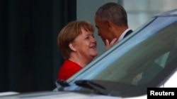 Former U. S. President Barack Obama leaves after a meeting with German Chancellor Angela Merkel at the chancellery in Berlin, Germany, April 5, 2019.