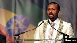 FILE - Ethiopia’s prime minister, Abiy Ahmed, addresses his country’s diaspora in Washington, the largest Ethiopian community outside the country, calling on them to return, invest and support their native land, on July 28, 2018.