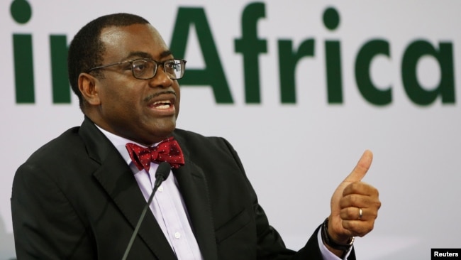 FILE - African Development Bank (AfDB) President Akinwumi Adesina gestures as he addresses a news conference at the annual meeting of AfDB in Gandhinagar, India, May 22, 2017.