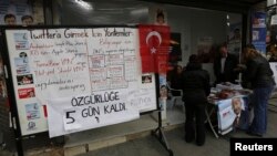 A board shows the alternative ways to access Twitter, is placed at an election campaign office of the main opposition Republican's People's Party (CHP) in Istanbul, March 25, 2014.