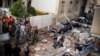 Soldiers inspect damage at scene of the explosion in the mostly Christian neighborhood of Achrafiyeh, Beirut, Lebanon, October 19, 2012. (Jeff Nuemann/VOA)