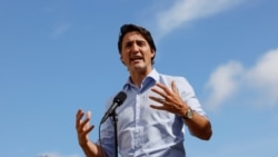 Canada's Prime Minister Justin Trudeau speaks to media after visiting a vaccination clinic in Ottawa, Ontario, Canada, Sept. 28, 2021.