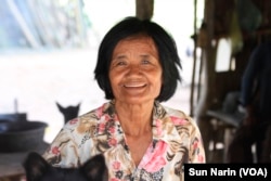 Seum Yun, 63, is the chief of Sovong village and has been tasked with registering residents for the CPP family book. "We don't know if they feel pressure or not, but we don't force them to sign," she said, Nov. 8, 2017.