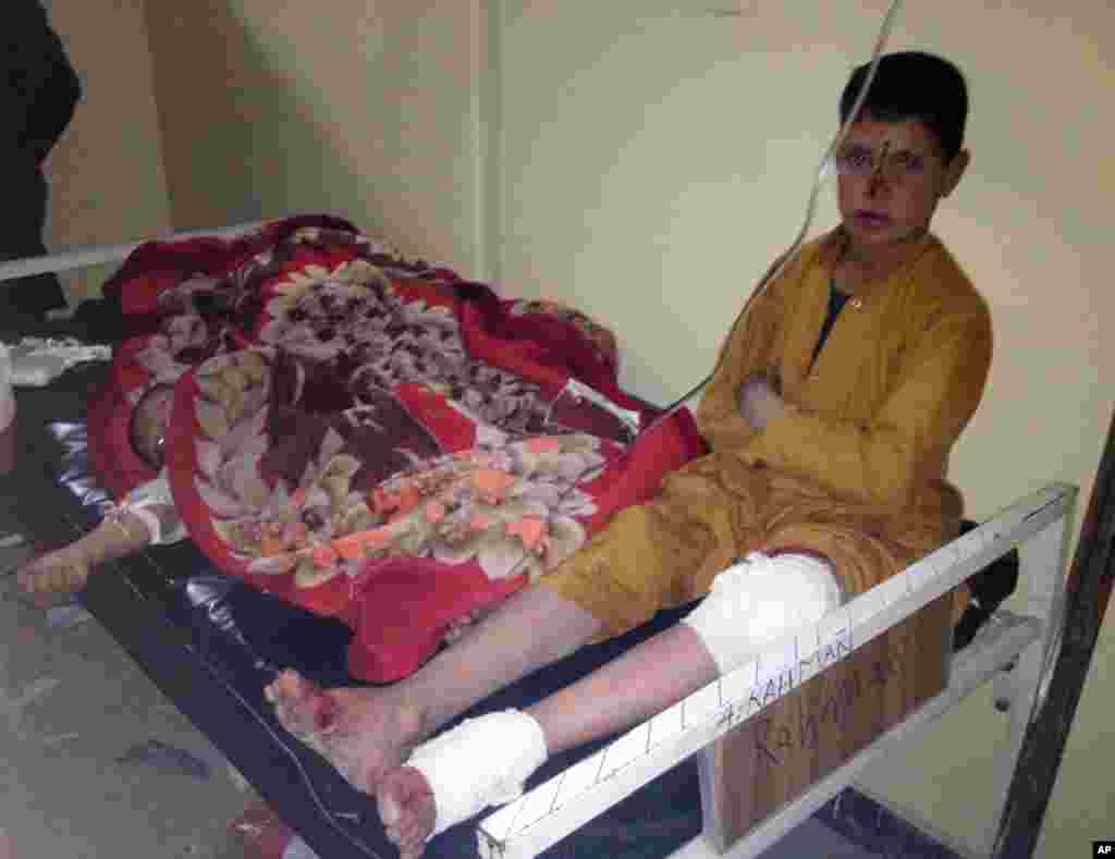 Afghan children are being treated at Paktika hospital after suicide attack at a volleyball match in Yahya Khel, Paktika province Nov. 23, 2014.