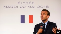 French president Emmanuel Macron speaks during the presentation of the French government's battle plan for the country's most deprived areas, May 22, 2018, at the Elysee Palace in Paris.