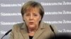 Germany's Chancellor Expresses Confidence in Euro's Durability