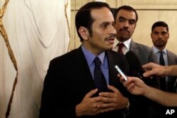 FILE - Qatari Foreign Minister Sheikh Mohammed bin Abdulrahman Al Thani, talks to journalists during a press conference in Rome, Saturday July 1, 2017.