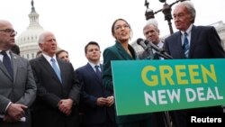 U.S. Representative Alexandria Ocasio-Cortez (D-NY) and Senator Ed Markey (D-MA) hold a news conference for their proposed Green New Deal at the U.S. Capitol in Washington, Feb. 7, 2019.